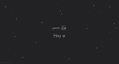 Faint stars scatter over a charcoal night sky with never stop looking up written in thin white script at the centre.