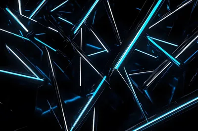 Broken angular shards scatter across black, their edges lit in strips of cyan and white, with light coming mainly from the upper left.