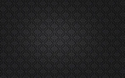 A small symmetrical damask motif repeats in tidy rows across slate grey, lit gently from the centre with the outer edges left in shadow.
