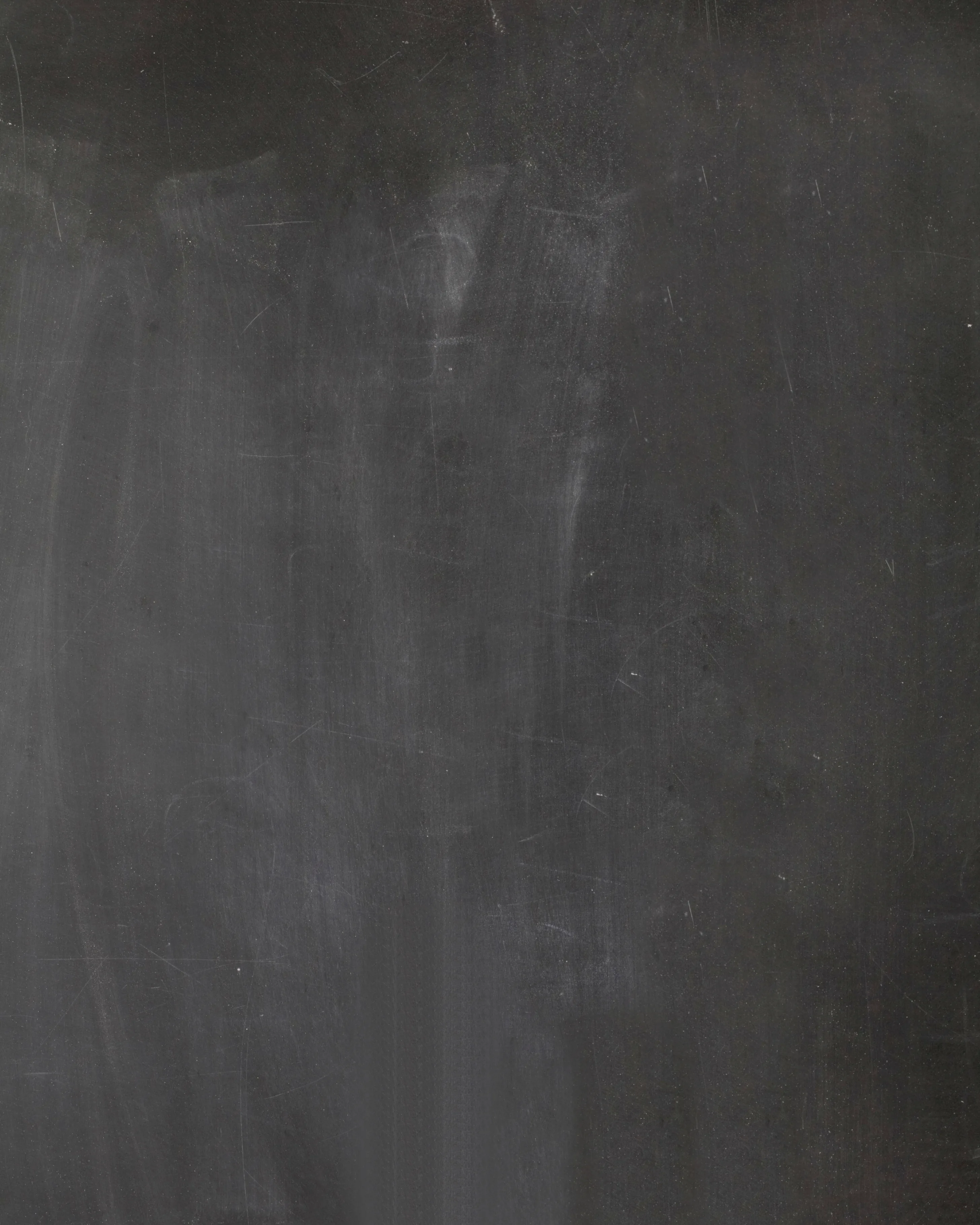 A tall crop of dark grey cloth with chalky smudges and faint vertical wear marks, lit softly from the upper left so the weave stays visible.