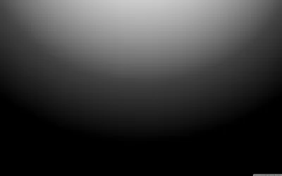 A pale grey dome sits along the top edge and falls away through mid grey into full black across the bottom third, leaving room for icons below.