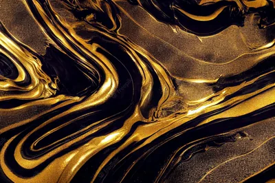 Veins of molten gold snake through near-black stone in loose S-curves, the grainy dark ground keeping most of the frame subdued.