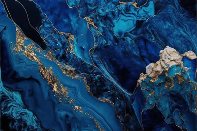 A polished navy slab crossed by a ribbon of gold flakes in the lower left, a rough beige stone patch sitting right of centre.