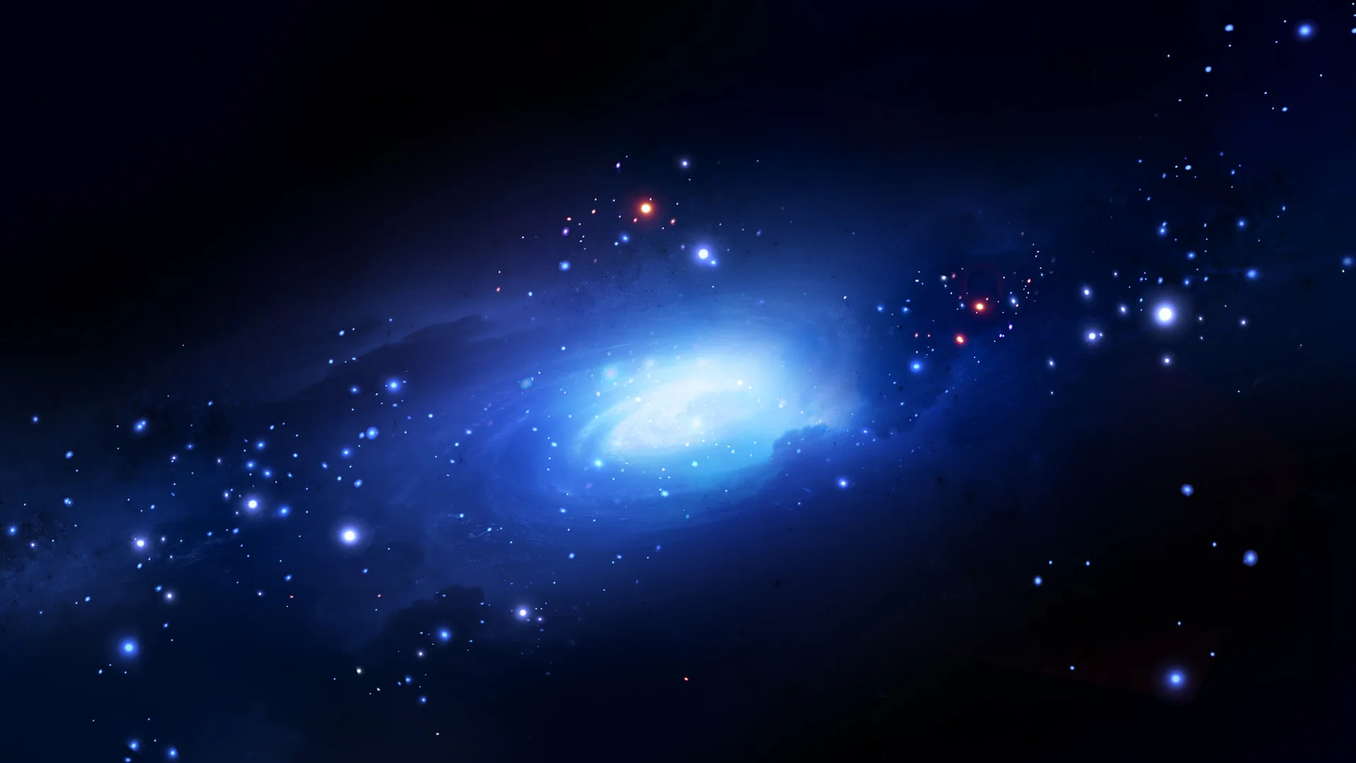A soft blue glow spreads from the centre of this nebula, ringed by scattered stars, with a couple of faint orange points above the core.