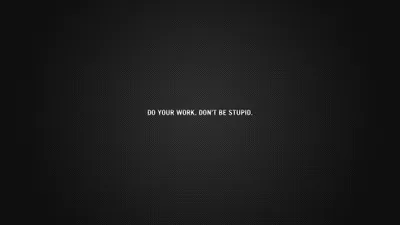 Small white capitals reading DO YOUR WORK, DON'T BE STUPID sit dead centre on a lightly textured grey-black wall.