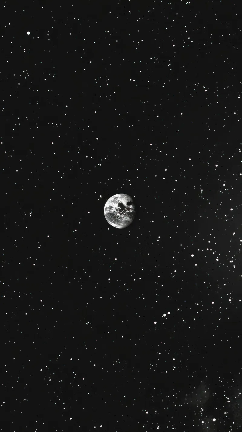 A single cloud-covered planet sits high in a tall black-and-white frame, the rest of the space filled with evenly spread pinpoint stars.