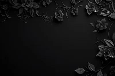 Carved black roses and leaves crowd the top corners and the right edge, leaving a wide empty panel of dark grey through the centre.