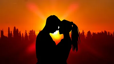 Two figures lean in close as the sun flares between their faces, a treeline running along the bottom and the sky burning from gold to deep orange.