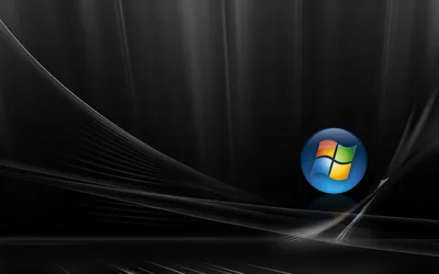 A round Windows badge glows on the right against dark folds with thin light streaks running underneath.