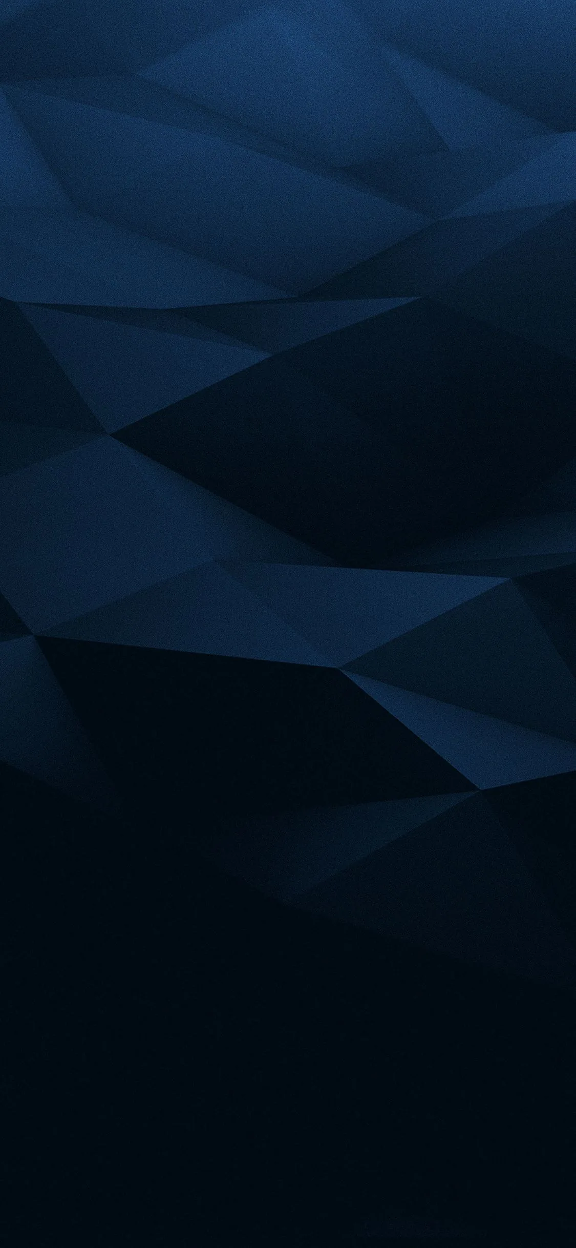 Faceted navy polygons tilt across the upper half like folded paper, the lower third dropping away into flat black.