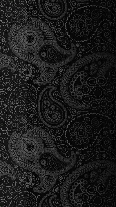 Rows of paisley teardrops and swirled circles repeat over a black ground, each shape outlined in faint grey so the pattern only shows up close.