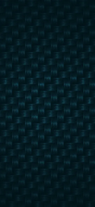 A tight basket weave of carbon fibre in near-black teal, the sheen shifting slightly from one row of the weave to the next.