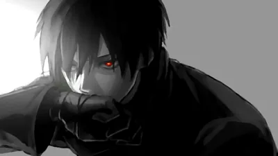 A greyscale close-up of a boy crouched forward in a dark coat, a single red iris the only colour in the whole frame.