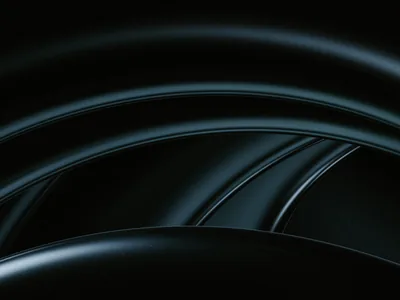 Smooth glassy arcs in near-black teal sweep across the frame, the sheen strongest along the centre seam while the top corners go fully dark.