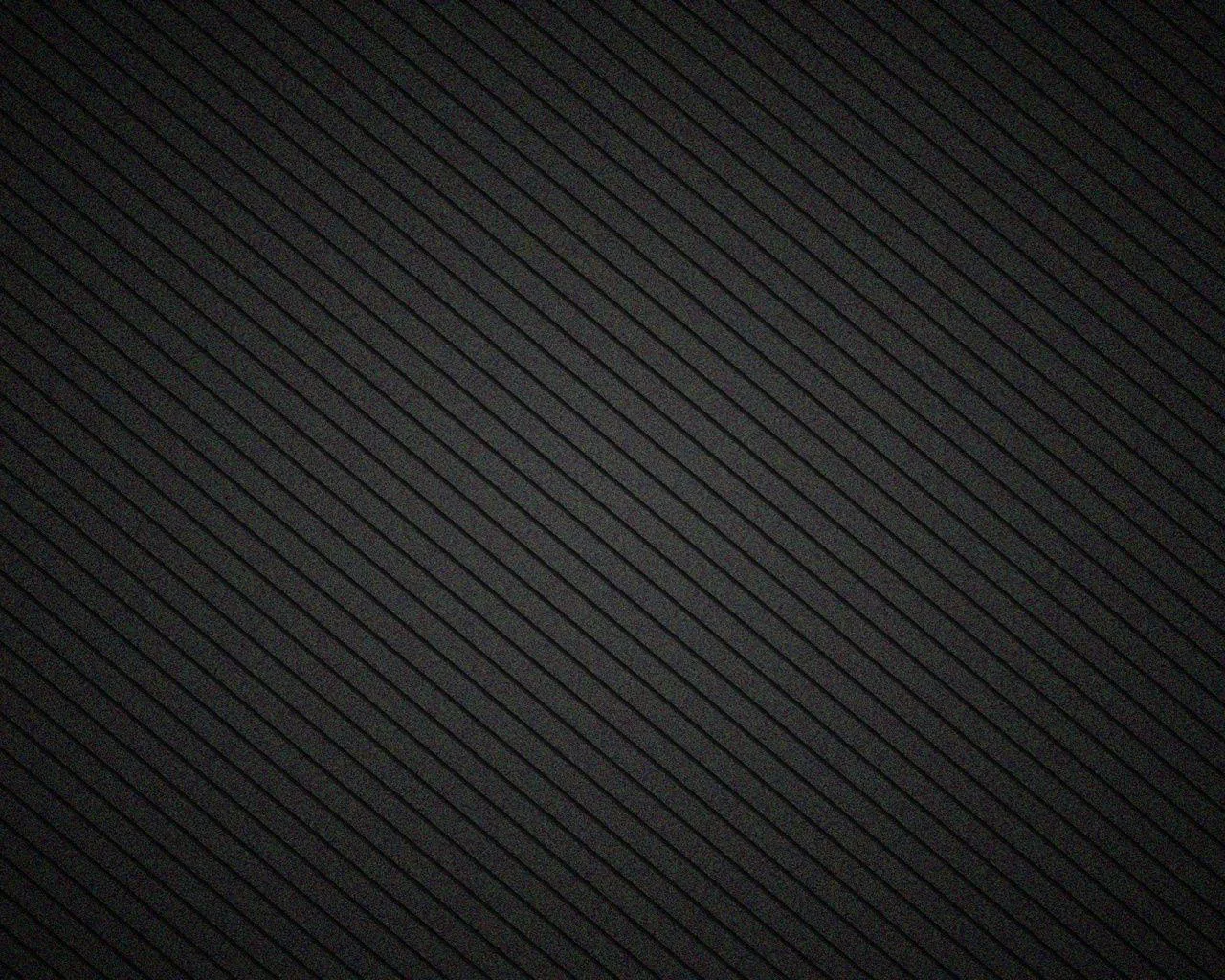 Thin diagonal pinstripes cross a charcoal ground under a soft central glow, the vignette darkening all four corners enough to hide desktop clutter.