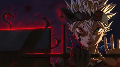 One horn, mismatched green and red eyes, black tendrils reaching across a dim red-lit room behind him.